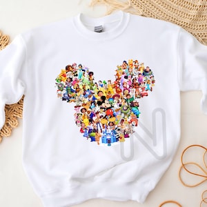 May include: White sweatshirt with a colorful Mickey Mouse silhouette made up of various Disney characters.