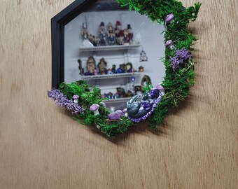 Moss mirror with sleeping dragon