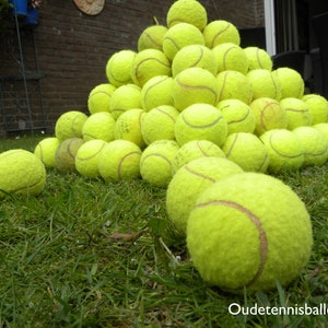 96 used tennis balls