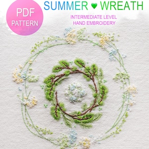 May include: A hand-stitched embroidery pattern for a summer wreath with green leaves and white and blue flowers. The pattern is labelled "SUMMER ♥ WREATH" and "PDF PATTERN". The text "INTERMEDIATE LEVEL HAND EMBROIDERY" is also included. The text "no hoops or embroidery stands needed" is at the bottom of the image.