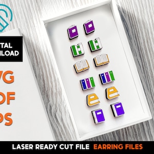 May include: A white box with a variety of colorful book and folder icons. The icons are arranged in rows and columns. The box is sitting on a wooden surface.  The text "LASER READY CUT FILE EARRING FILES" is printed below the box.