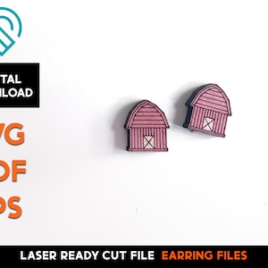 May include: Two laser cut wooden earrings shaped like red barns with white doors and windows. The earrings are ready to be assembled and are perfect for a farmhouse or rustic theme.