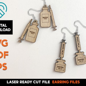 May include: A pair of laser cut wooden earrings featuring a small bottle with the word "BOTOX" and a syringe. The earrings are designed for crafting and are ready to be assembled.