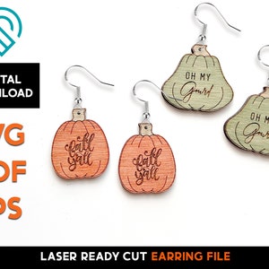 May include: Laser cut wooden pumpkin earrings. Two pairs of earrings are shown. One pair is orange with the text "Fall Y'all" and the other pair is green with the text "Oh My Gourd".