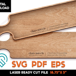 May include: A laser-cut wooden serving board with two handles. The board is 18.75 inches by 5 inches and has the text "char-cu-te-rie" and "a French term for assembling cheese and other fancy shit." engraved on it.