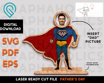 May include: Laser cut file for a Father's Day sign featuring a superhero with a red cape and a yellow belt. The sign has a space to insert a photo of a dad. The text "Super Dad" is on the superhero's chest.