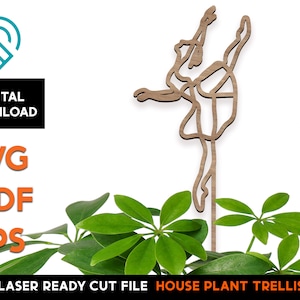 May include: Laser cut wooden ballerina house plant trellis. The trellis is designed to look like a ballerina in a dancing pose. It is a great way to add a touch of elegance to your home decor.