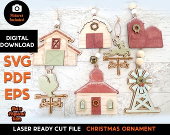 May include: A selection of laser-cut wooden Christmas decorations featuring farm-themed designs such as barns, a church, and a windmill. The ornaments are painted in muted tones and strung with twine and beads. The image includes the text "DIGITAL DOWNLOAD" and "CHRISTMAS ORNAMENT".