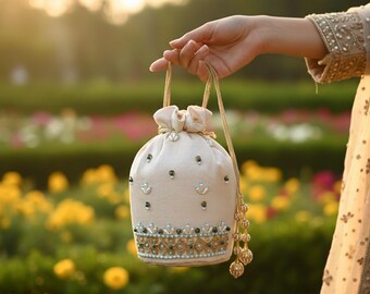Handmade Pakistani Bridal Potli Bag: Embroidered Off-White Clutch