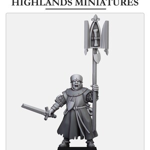 May include: A miniature figure of a medieval knight wearing a black robe and chainmail armor, holding a sword and a banner with a cross and a bone. The banner is attached to a long pole.