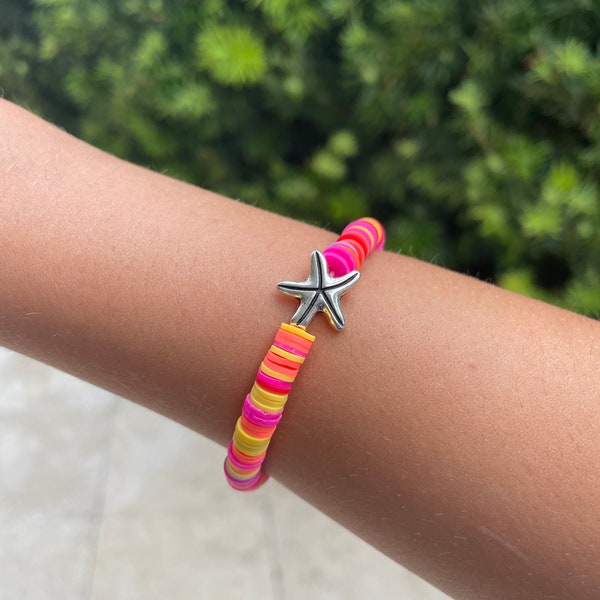 1 bracelet with bright pink, light purple, bright orange, and yellow Bracelets Clay,  -  Bright Colored - STRETCHY ( water Proof )