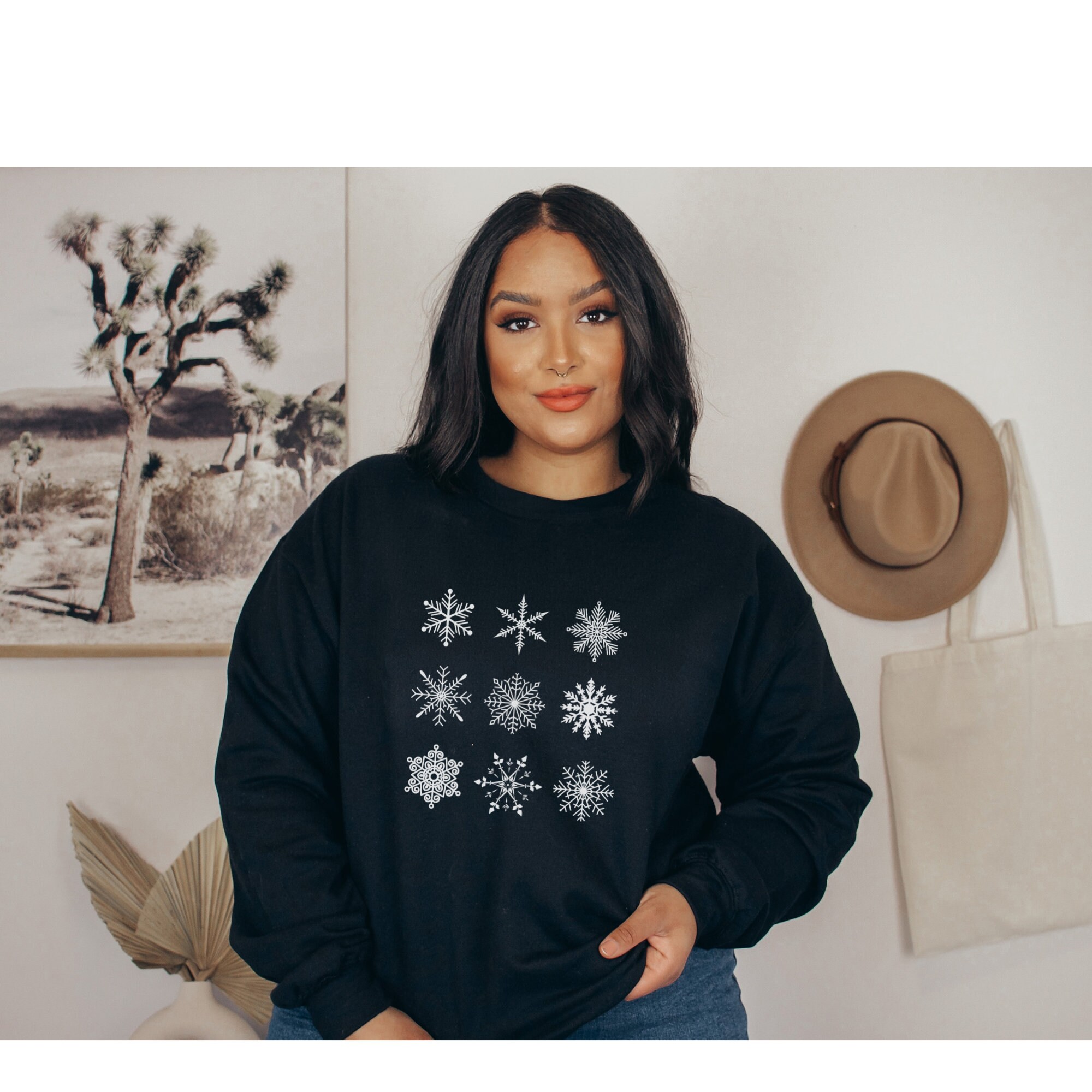Black snowflake sweater sale