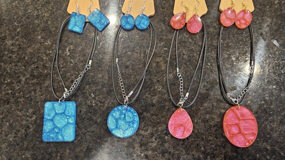 Handmade resin jewelry, custom handmade poured resin necklaces, custom crafted resin earrings, dragon scale resin jewelry, nickel free metal
