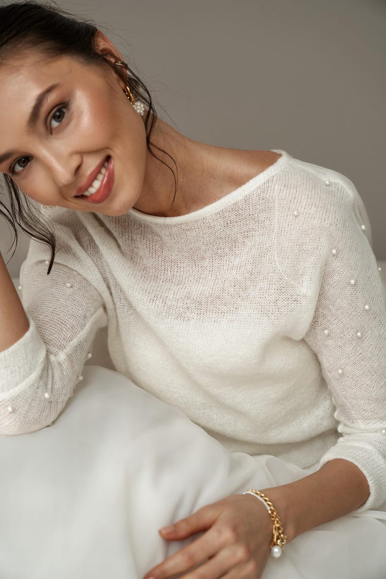 warm shrug for bride,
off the shoulder top,
wedding dress topper,
fall wedding cover,
bridal cover up,
wool wedding sweater,
bridal jacket,
wedding shawl wrap,
wedding sleeves,
offshoulder sweater,
white shrug,
wedding bolero,
spring wedding,