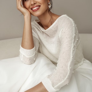 warm shrug for bride,
off the shoulder top,
wedding dress topper,
fall wedding cover,
bridal cover up,
wool wedding sweater,
bridal jacket,
wedding shawl wrap,
wedding sleeves,
offshoulder sweater,
white shrug,
wedding bolero,
spring wedding,