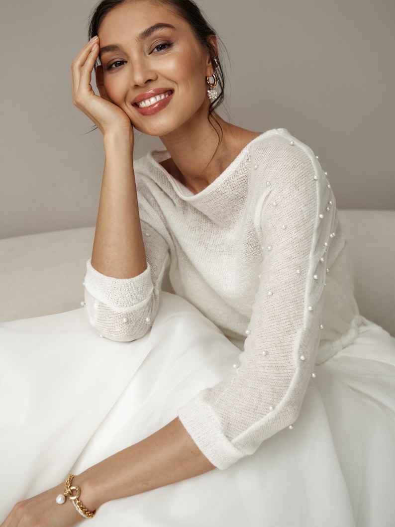 warm shrug for bride,
off the shoulder top,
wedding dress topper,
fall wedding cover,
bridal cover up,
wool wedding sweater,
bridal jacket,
wedding shawl wrap,
wedding sleeves,
offshoulder sweater,
white shrug,
wedding bolero,
spring wedding,