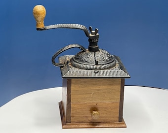 Wood & Cast Iron Antique Coffee Grinder. Made of Wood and Iron.