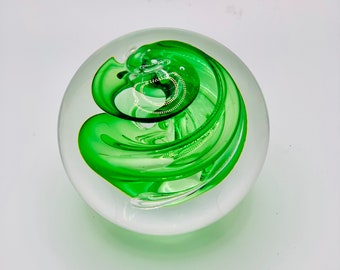 Clear Art Glass Paperweight with Green Swirl Decoration.