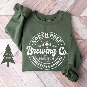 Brauerei Co Nordpol Sweatshirt | Weihnachts T-Shirts für Frauen | Weihnachten Rundhalsausschnitt | Urlaub Sweatshirt | Retro Weihnachts Pullover