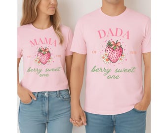 May include: Two pink t-shirts with a strawberry graphic and the text "Mama of the berry sweet one" and "Dada of the berry sweet one".