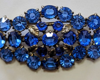 Broche de diamantes de imitación azul brillante de la década de 1930, espalda abierta, piedras sin laminar