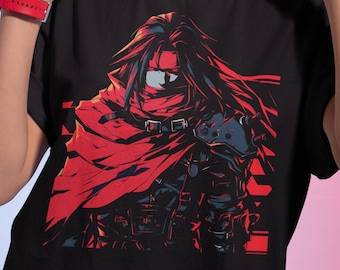 May include: Black t-shirt with a graphic print of a character from the Final Fantasy video game series. The character is wearing a red cape and has long black hair.