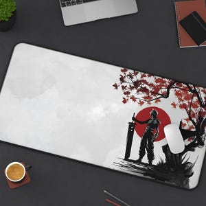 May include: A black and white illustration of a character holding a sword, standing in front of a red sun and a tree with red leaves. The background is white with a watercolor effect.