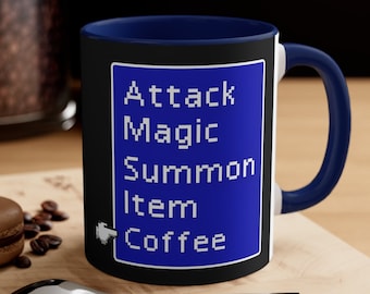 May include: A black and blue coffee mug with a blue menu on the front that says "Attack, Magic, Summon, Item, Coffee".