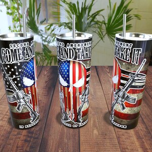May include: Three stainless steel insulated tumblers with lids and straws. Each tumbler features a design with the American flag, a skull, and a rifle. The text on the tumblers reads "Second Amendment, Come and Take It", "Stand and Take", and "Take It".