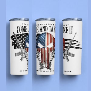May include: Three white tumblers with a patriotic design. The tumblers feature a skull with an American flag design, a rifle, and the text "Second Amendment Come and Take It".