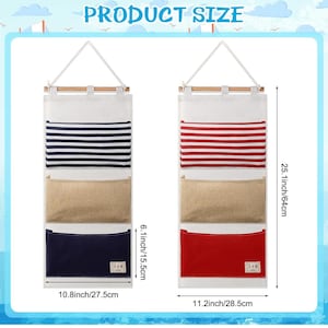 May include: Two wall-mounted storage organizers with three pockets each. The organizer on the left has blue and white striped fabric, beige burlap fabric, and dark blue fabric. The organizer on the right has red and white striped fabric, beige burlap fabric, and red fabric. Both organizers measure 25.1 inches tall, 10.8 inches wide, and 6.1 inches deep.