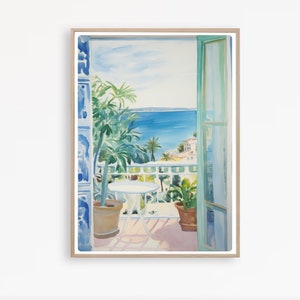 May include: A watercolor painting of a balcony overlooking the ocean. The balcony has a white table and chairs, and a potted plant. The ocean is blue and the sky is light blue. The painting is framed in a light wood frame.