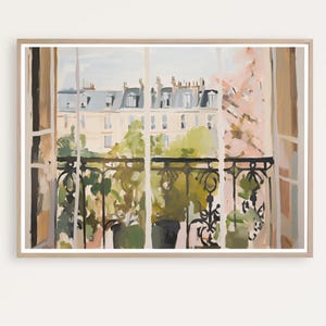 May include: A painting of a window view with a balcony overlooking a city street. The balcony has a wrought iron railing and is surrounded by lush greenery. The building across the street is a pale yellow with white trim and has several windows. The sky is a light blue with some clouds.