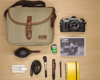 Canon AE-1 film camera kit with bag, film and extras !