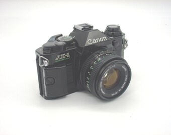 Canon AE-1 PROGRAM film camera with 50mm lens