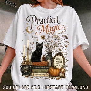 May include: A white t-shirt featuring a graphic print with the text Practical Magic. The design includes a black cat sitting on a stack of books, a pumpkin, candles, a cauldron, a mirror with the text There's a little witch in all of us, and flowers.