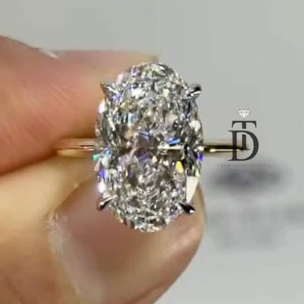 Riesiger Verlobungsring mit ovalem 6-Karat-Moissanit. Großer ovaler Moissanit-Solitär-Ehering aus 14-karätigem Gelbgold mit scharfer Kantenverarbeitung für Damen.