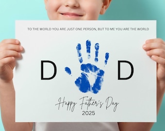 May include: A white card with the text "TO THE WORLD YOU ARE JUST ONE PERSON, BUT TO ME YOU ARE THE WORLD" and "Happy Father's Day 2025". The card features a blue handprint and the letters "D D".