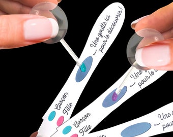 Baby gender announcement color changing pregnancy test. Chemistry experiment announces girl or boy