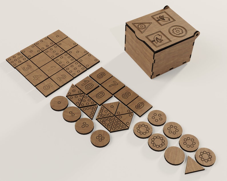 May include: Wooden box with a lid containing a set of wooden tiles with numbers and dots. The tiles are arranged in a grid pattern. There are also several wooden circles with dots and a wooden triangle.