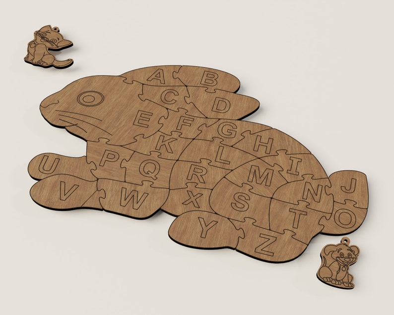 K&ouml;nnte beinhalten: Holzpuzzle eines Kaninchens, wobei jedes St&uuml;ck die Form eines Buchstabens des Alphabets hat. Das Puzzle ist aus hellbraunem Holz gefertigt und hat eine nat&uuml;rliche Holzoptik.
