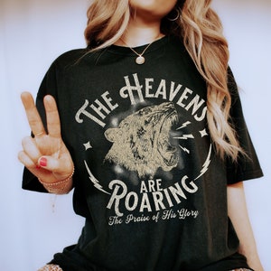 Christian Shirts The Heavens are Roaring Shirt Oversized Bible Verse Faith Based Apparel Christian Gifts for Her On Earth As it is in Heaven