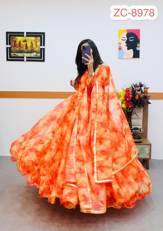 Pastel orange foil printed flared dress by The Anarkali Shop