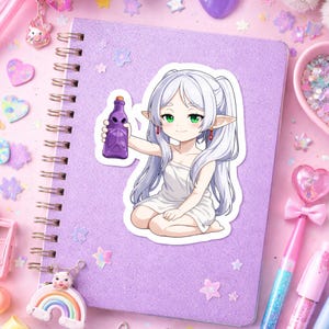 May include: A sticker featuring an anime-style character with white hair and green eyes, holding a purple bottle. The character is kneeling on a purple notebook. The background includes decorative elements like hearts and stars.