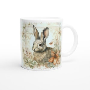 Rabbit Mug 0.33l – White ceramic mug with vintage rabbit and flower illustration, ideal gift for animal and vintage lovers