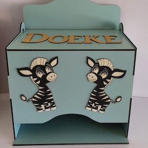 Cięcie laserowe, plik cyfrowy. Pudełko na pieluchy. Pudełko na pieluchy.