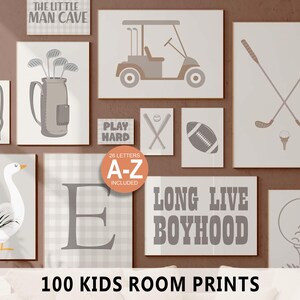 May include: A collection of framed prints with a sports and kids theme. The prints feature golf clubs, a golf cart, a football, and the text "THE LITTLE MAN CAVE" and "LONG LIVE BOYHOOD". The image also includes the text "100 KIDS ROOM PRINTS".