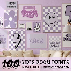 May include: A collection of framed wall art with a purple and white color scheme. The prints feature phrases like "Girl Power," "Sisters make the best friends," and "XOXO." Other designs include a flower, a lightning bolt, and a smiley face.