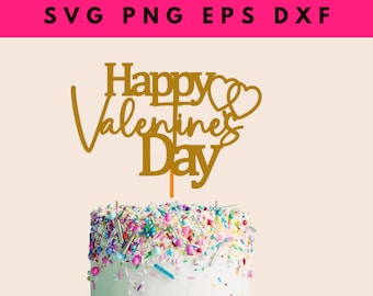 May include: Gold Happy Valentine's Day cake topper with two hearts. The topper is on top of a white cake with colorful sprinkles.