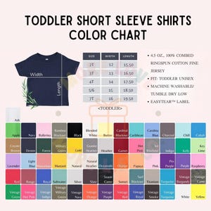 May include: Color chart for toddler short sleeve shirts. The chart displays a navy blue shirt with measurements and a color palette with various shades, including black, pink, and green. The text includes shirt sizes and fabric details.